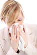Young woman with a head cold
