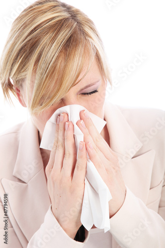 Photo: Young woman with a head cold Young woman with a head cold