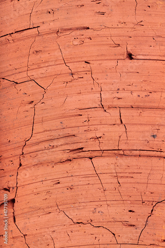Photo: The texture of red brick, close-up The texture of red brick, close-up