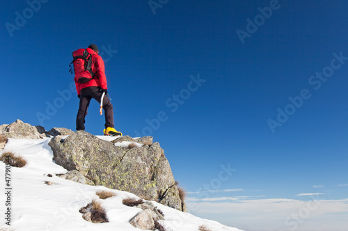Photo: Trekker observes the horizon Trekker observes the horizon
