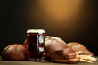 tankard of kvass and rye breads with ears,
