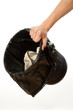 Photo: Hand holding trash bin Hand holding trash bin
