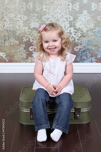 Photo: Little Girl on Suitcase Little Girl on Suitcase
