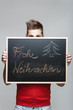 Frohe Weihnachten auf einer Tafel