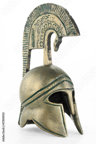Photo: Ancient greek helmet replica on white background Ancient greek helmet replica on white background