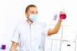 Young female scientist working in laboratory