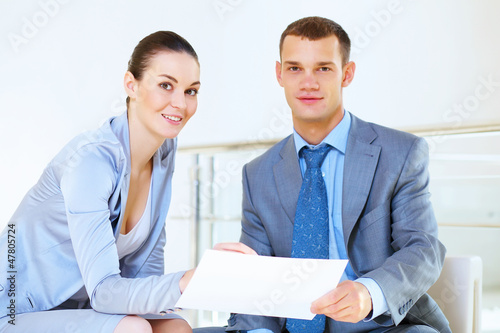 Photo: a portrait of a businesswoman and businessman a portrait of a businesswoman and businessman