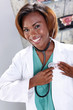 Doctor checks her heart beat