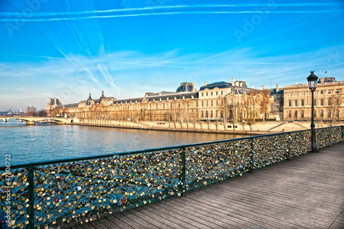 Photo: Louvre Museum and Pont des arts, Paris - France Louvre Museum and Pont des arts, Paris - France