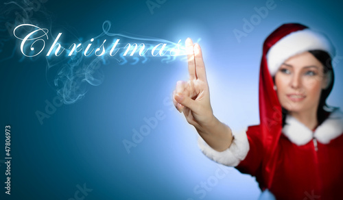 Photo: Portrait of girl wearing santa claus clothes Portrait of girl wearing santa claus clothes