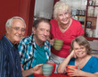 Four Smiling Friends in Bistro