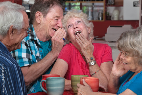 Photo: Laughing Elderly Couple with Friends Laughing Elderly Couple with Friends