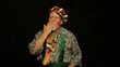 Clown with a movie clapperboard