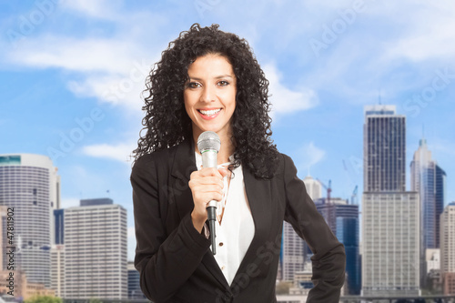 Photo: Talking on the microphone Talking on the microphone
