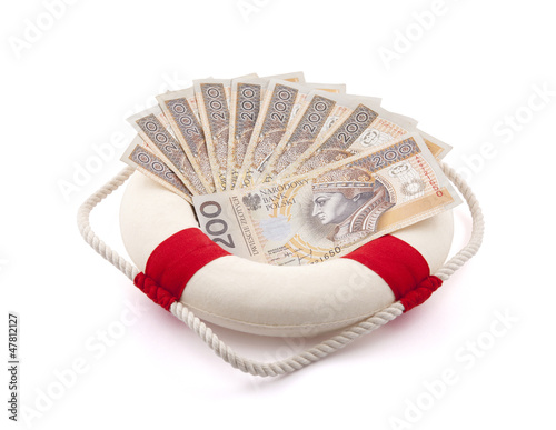 Photo: Polish money in lifebuoy with clipping path Polish money in lifebuoy with clipping path
