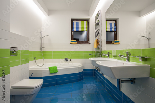 Photo: Travertine house - contemporary bathroom Travertine house - contemporary bathroom