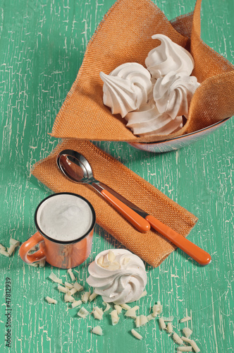 Photo: Meringues and cup of milk Meringues and cup of milk