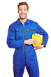 Lachender Handwerker im Blaumann