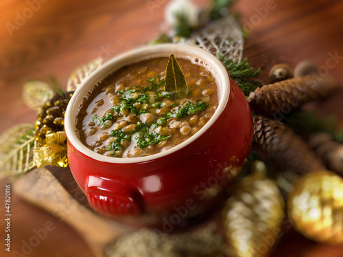 Photo: traditional christmas lentils soup, selective focus traditional christmas lentils soup, selective focus