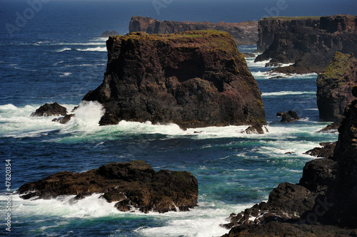 Photo: Rocky coast with cliffs and splashing water at Esha Ness. Rocky coast with cliffs and splashing water at Esha Ness.