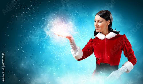 Photo: Portrait of girl wearing santa claus clothes Portrait of girl wearing santa claus clothes