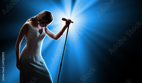 Photo: Female singer on the stage Female singer on the stage