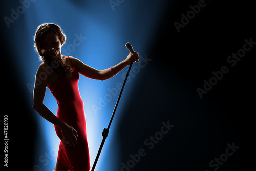 Photo: Female singer on the stage Female singer on the stage