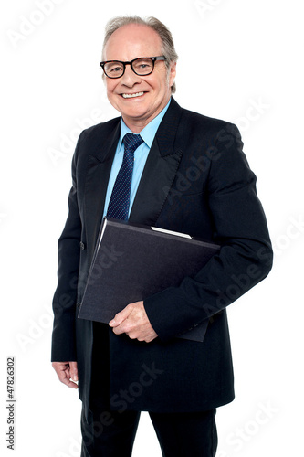 Photo: Senior executive is off to the boardroom Senior executive is off to the boardroom