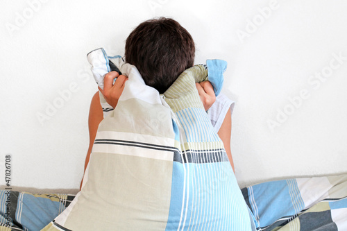 Photo: Depressed Man With Pillow Depressed Man With Pillow