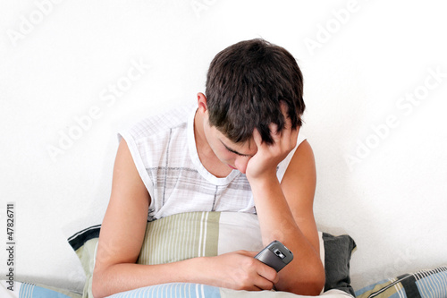 Photo: Sorrowful Teenager get SMS Sorrowful Teenager get SMS