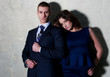 Stylish young couple posing outdoors