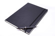 Open notebook with a pen