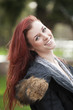 Young Woman with Beautiful Auburn Hair
