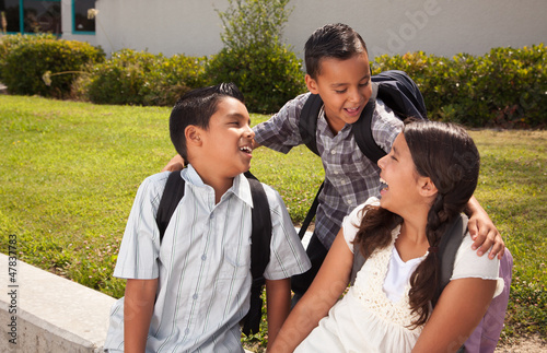 Photo: Cute Brothers and Sister Talking, Ready for School Cute Brothers and Sister Talking, Ready for School