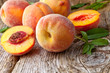 fresh peaches on wood  background