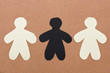 two white paper man with black man in the center on recycle pape