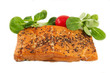 A peace of smoked spiced salmon with vegetables