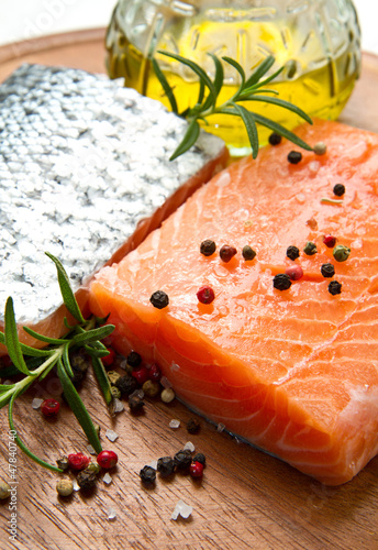Photo: Fresh salmon fillet on wooden board Fresh salmon fillet on wooden board