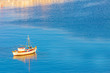 White Boat at dawn, Santorini island Greece