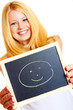 pretty smiling woman with blackboard isolated on white