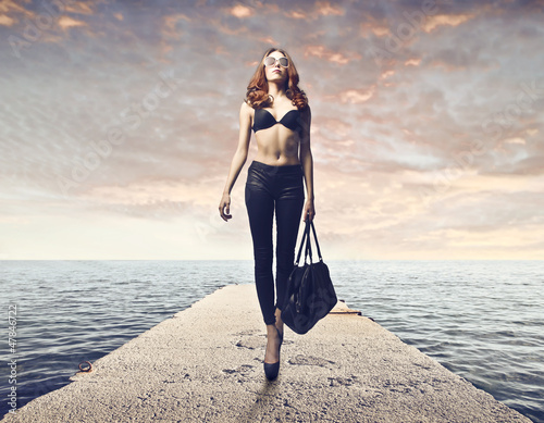 Photo: Woman on a Pier Woman on a Pier