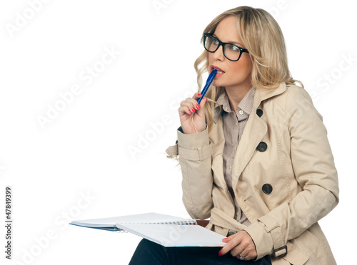 Photo: woman writing in the notebook woman writing in the notebook