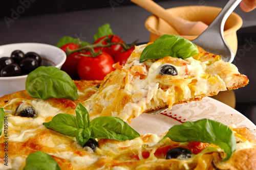 Photo: Pizza in black Pizza in black