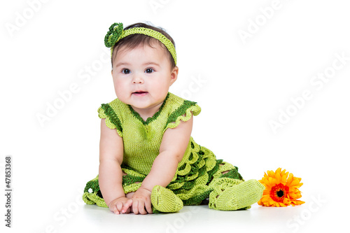 Photo: cute little girl with flower gift, isolated on white cute little girl with flower gift, isolated on white