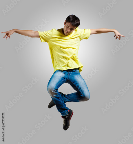 Photo: Young man dancing and jumping Young man dancing and jumping