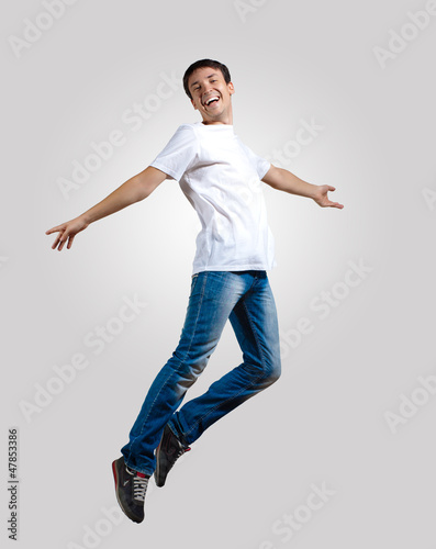 Photo: Young man dancing and jumping Young man dancing and jumping