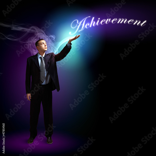 Photo: Businessman with light shining Businessman with light shining