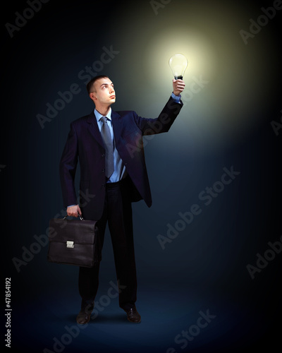 Photo: Businessman with light shining Businessman with light shining