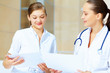 Photo: Portrait of two friendly female doctors Portrait of two friendly female doctors
