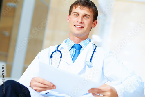 Photo: friendly male doctor friendly male doctor